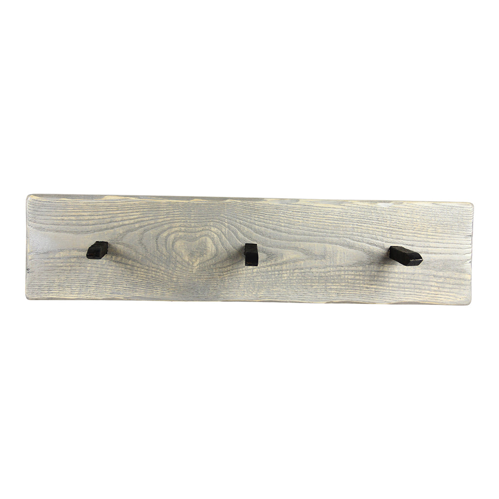 This multi coat hanger is perfect for small spaces, or to create a custom wall. Made with an authentic railway spike from the early 1900's, it can be mounted on any wall to hang coats, umbrellas, bags, hanging plants, etc. Mounting is easy - simply hang using the recess on the back. Its come with  a set of screws and plugs