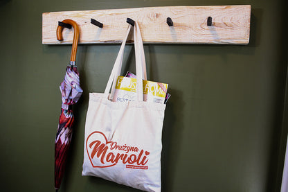 This multi coat hanger is perfect for small spaces, or to create a custom wall. Made with an authentic railway spike from the early 1900's, it can be mounted on any wall to hang coats, umbrellas, bags, hanging plants, etc. Mounting is easy - simply hang using the recess on the back. Its come with  a set of screws and plugs