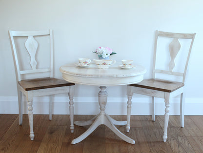 This French cottage style coffee table is hand crafted by Canadian Amish/Mennonite craftsman. Made out of reclaimed ,rustic, natural Canadian hardwood ash. This timeless vintage design combine new and old style. Unique wire brushed ,distressed and organic finish it is easy to maintain and is our statement that we are supporting natural wood beauty.