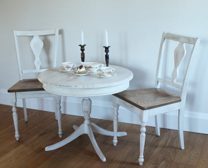 This French cottage style coffee table is hand crafted by Canadian Amish/Mennonite craftsman. Made out of reclaimed ,rustic, natural Canadian hardwood ash. This timeless vintage design combine new and old style. Unique wire brushed ,distressed and organic finish it is easy to maintain and is our statement that we are supporting natural wood beauty.